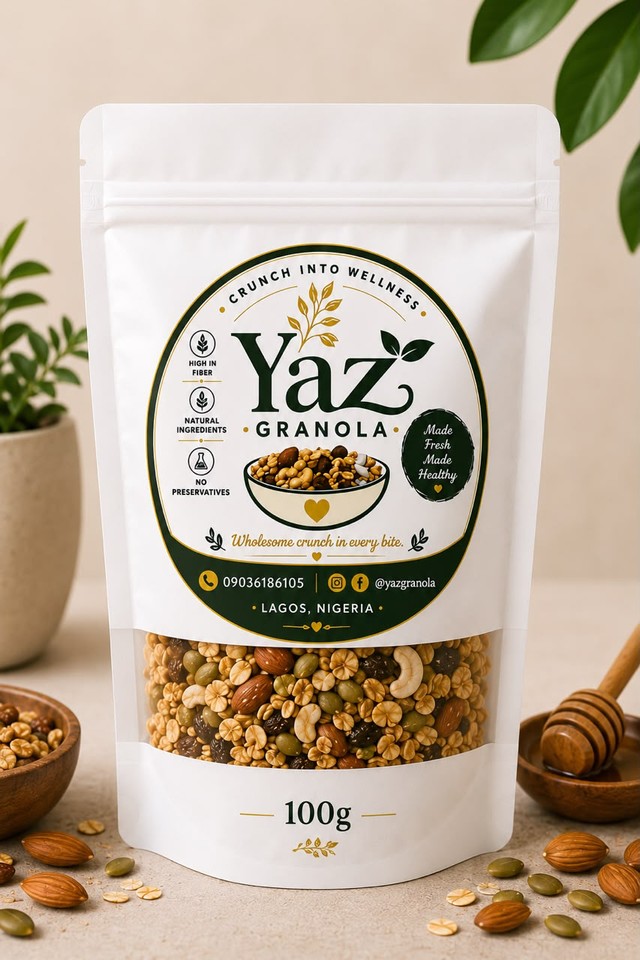 Yaz Granola pouch surrounded by nuts and honey